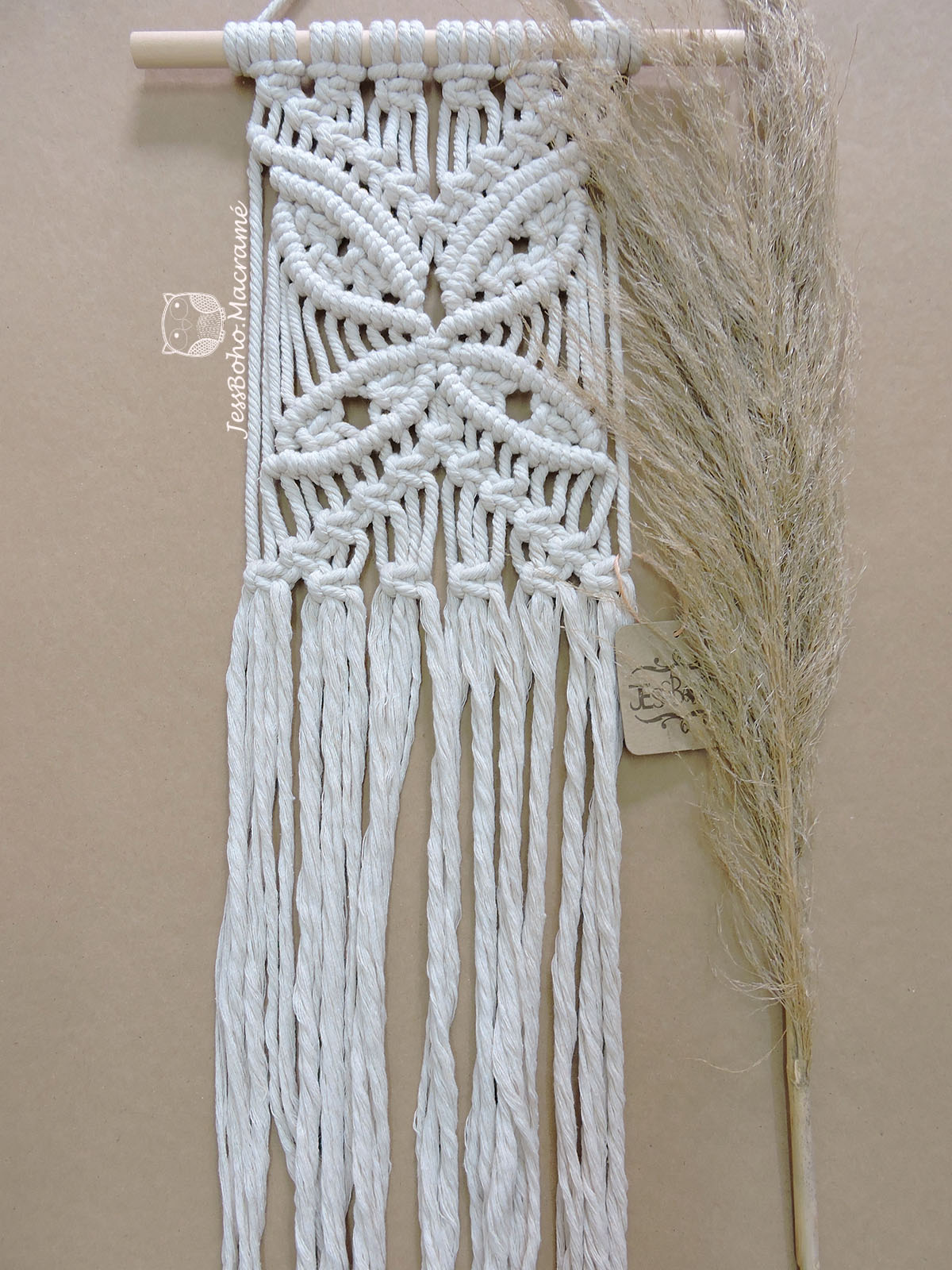 Tapiz de macramé mariposa.