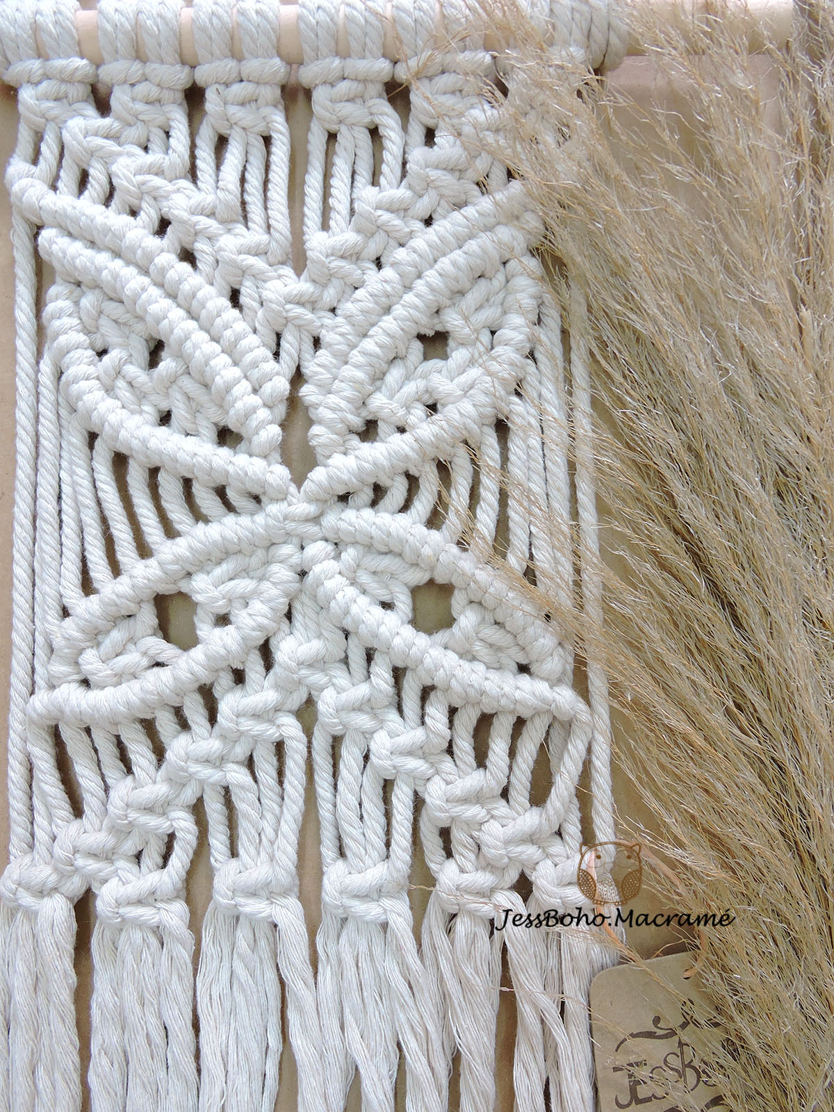 Tapiz de macramé mariposa.
